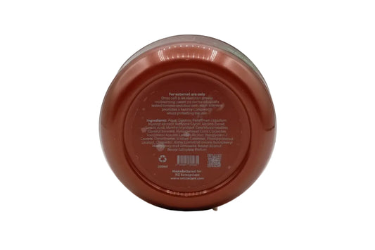 Back view of a red container with text and a barcode on a white background