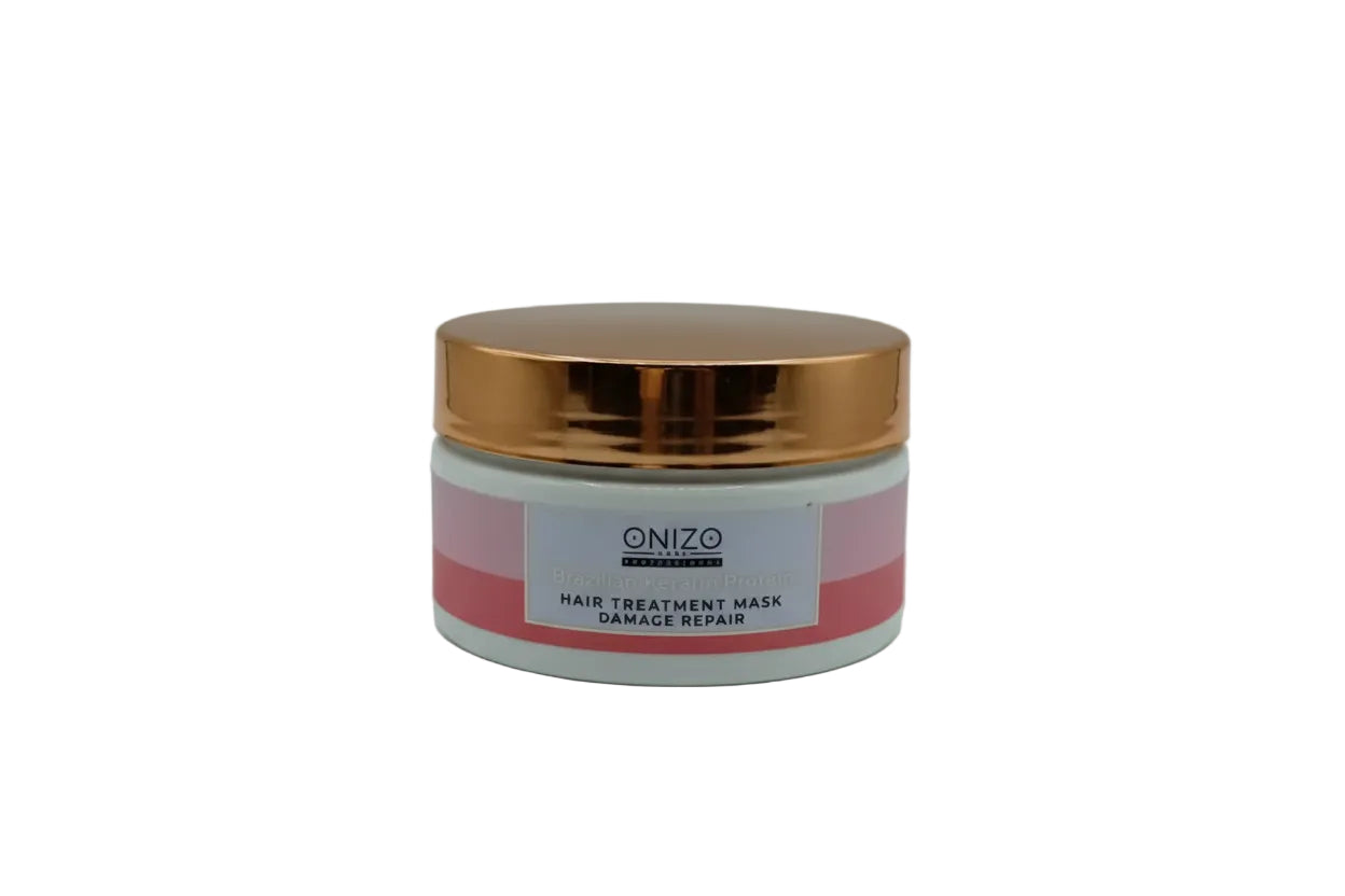 Hair treatment mask jar with gold lid on a white background