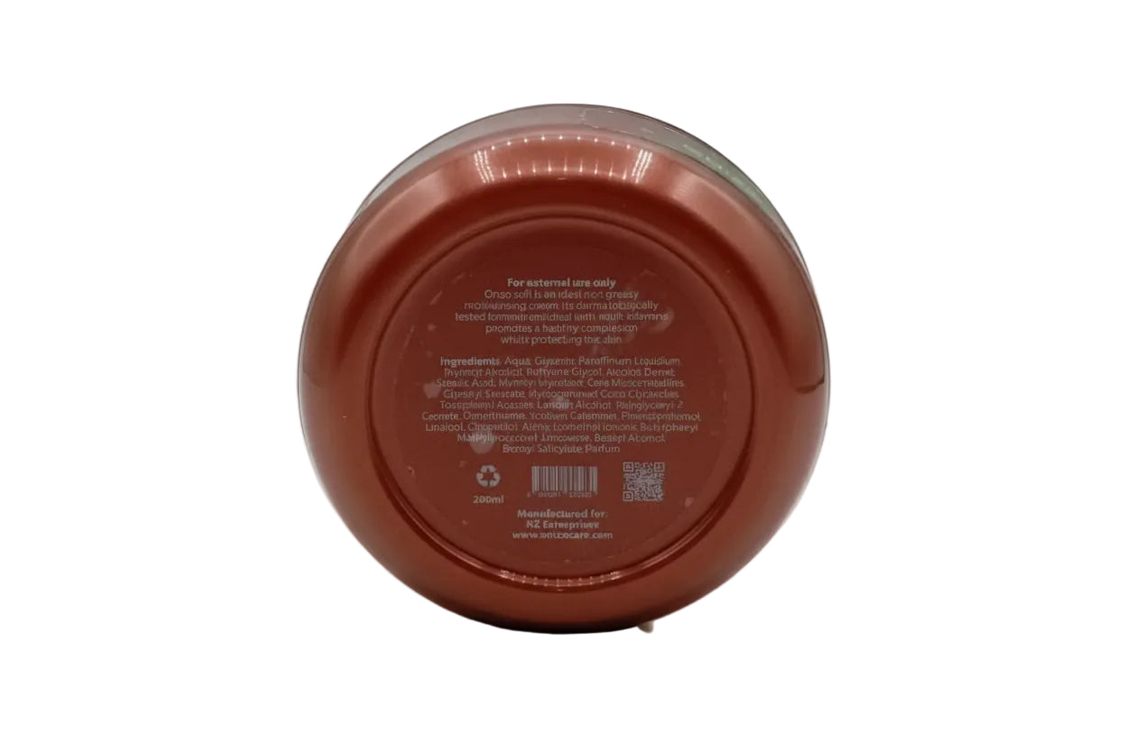 Back view of a red container with text and a barcode on a white background